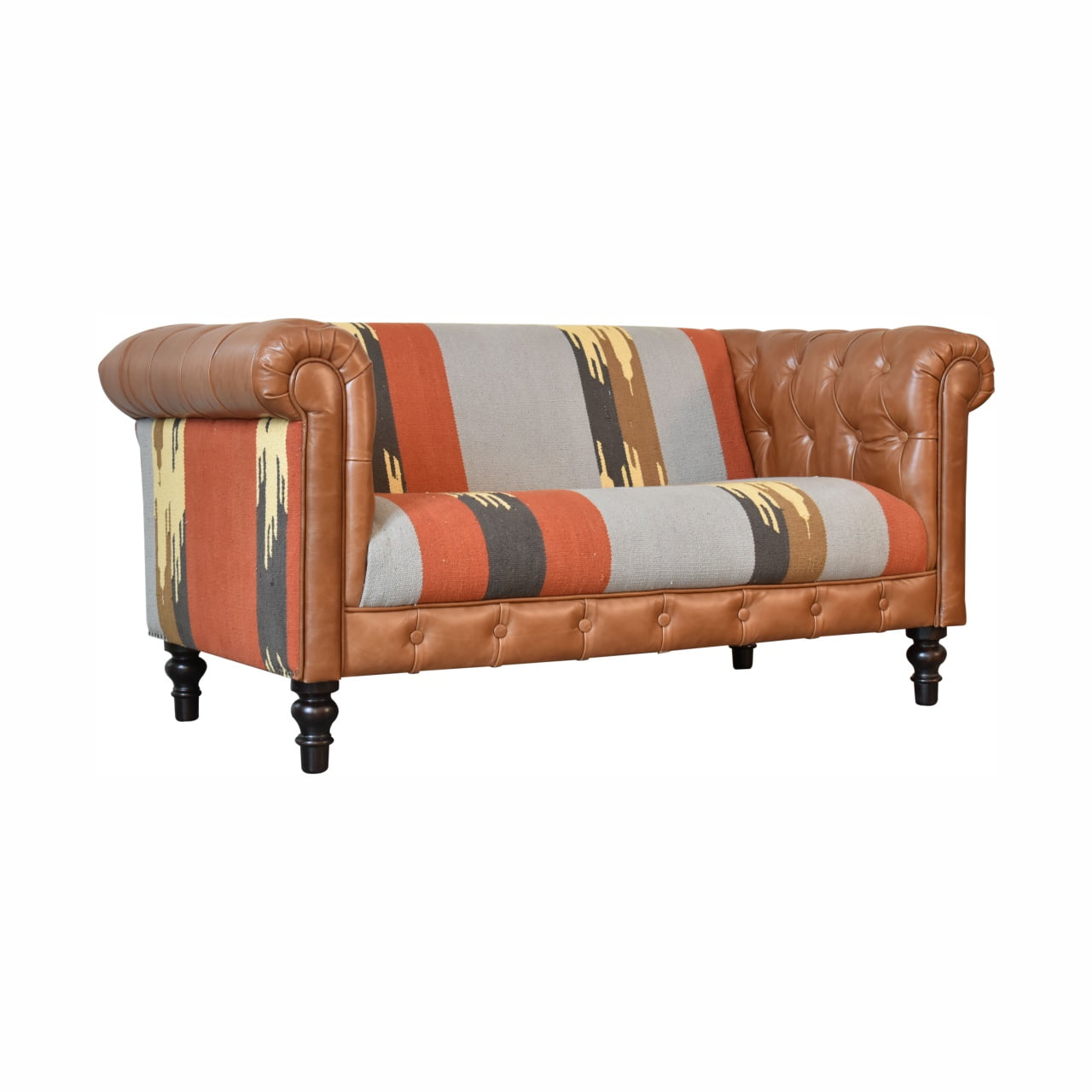Handcrafted Kilim and Leather Chesterfield Sofa featuring a tufted tan leather frame, traditional rolled arms, and a bold multicolour kilim upholstery with geometric patterns, blending rustic charm and contemporary design.