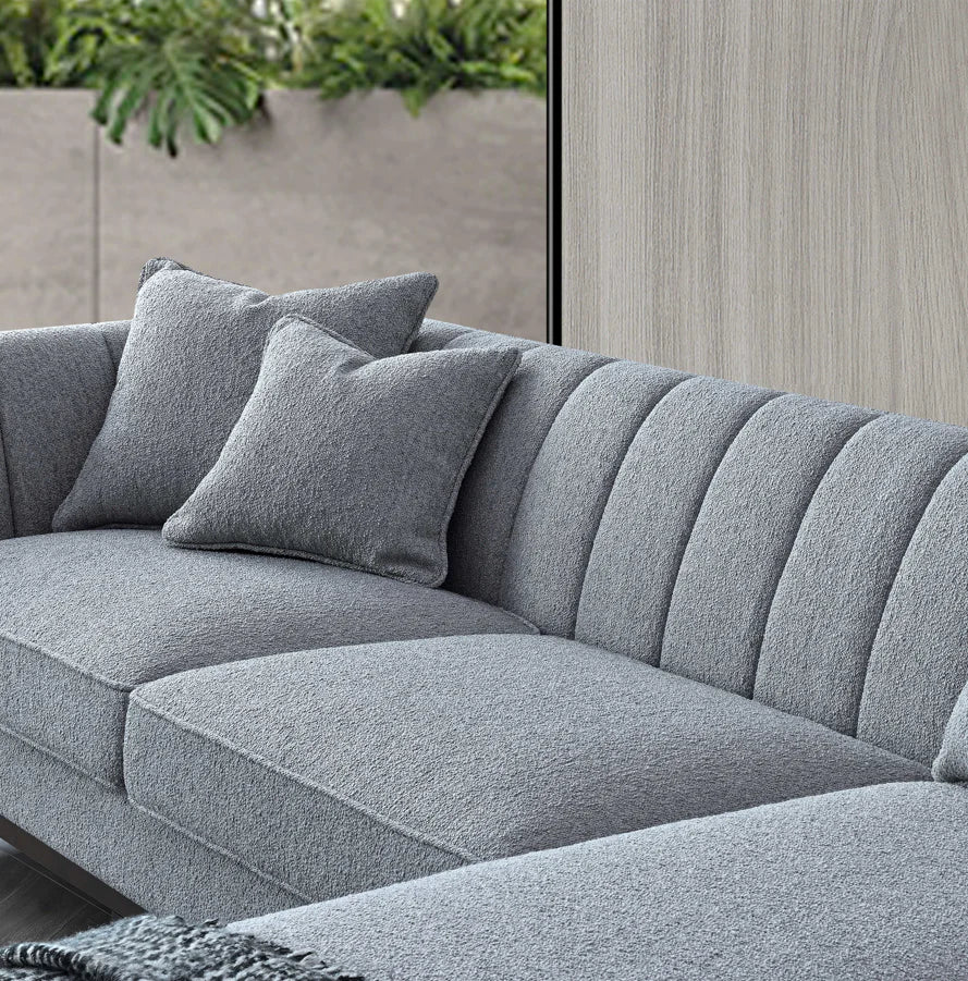 Aluxo Cooper Right Hand Corner Sofa in Dolphin Bouclé with wooden plinth base, mid-century modern design, and deep cushions for stylish living room comfort