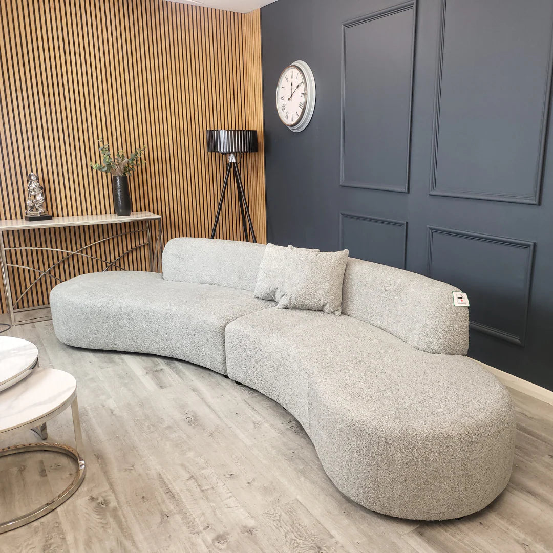 Miami Curved Cinema Sofa in Bouclé with sculptural curved design, soft fabric upholstery, deep seats and modern silhouette, available in 6 stylish colours