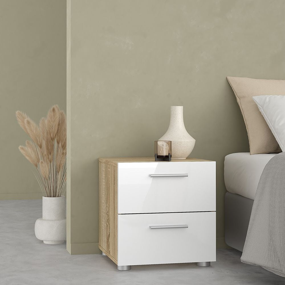 Modern white gloss and oak bedroom furniture set including wardrobe and drawers.