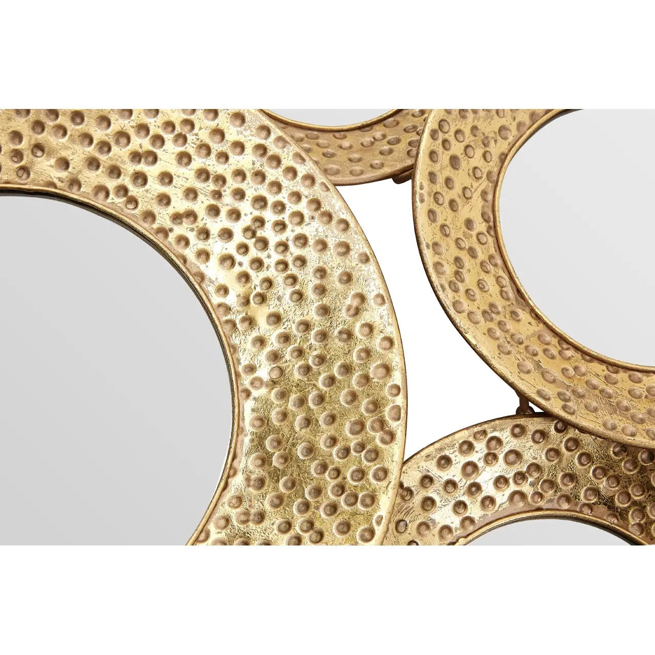 Round hammered gold wall mirror with metallic textured frame, ideal for modern luxe and elegant home interiors