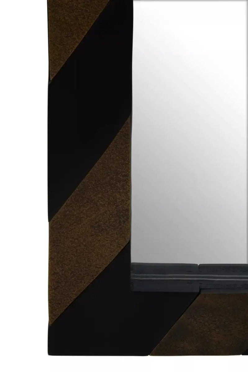 Geometric wall mirror with black and gold metal frame, ideal for modern luxe interiors and statement wall styling