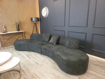 Miami Curved Cinema Sofa in Bouclé with sculptural curved design, soft fabric upholstery, deep seats and modern silhouette, available in 6 stylish colours