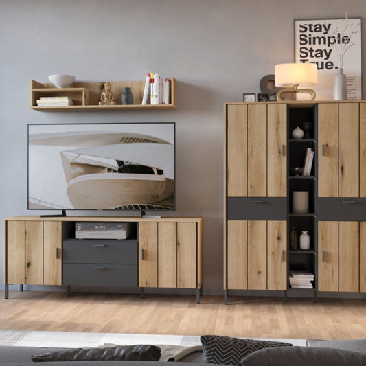 Arundel TV cabinet in oak and grey finish, featuring 2 drawers, 2 doors, open shelves and tall black metal legs for a modern industrial look.