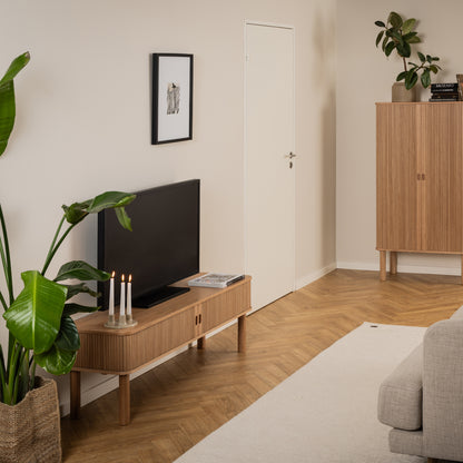 Langley ribbed oak TV unit with sliding tambour doors and rounded edges – modern media cabinet with Scandinavian design