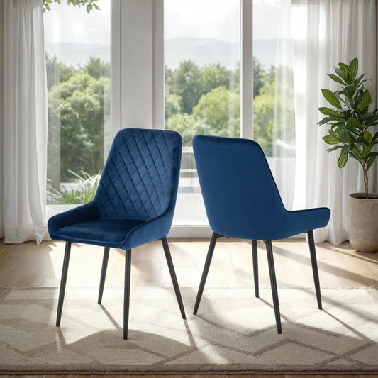 Avery velvet dining chair in sapphire blue with black metal legs – modern padded seat