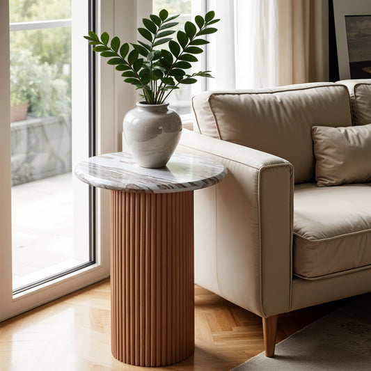 Ashford pedestal side table with round natural marble top and ribbed mango wood base, shown with dimension labels for height and diameter.