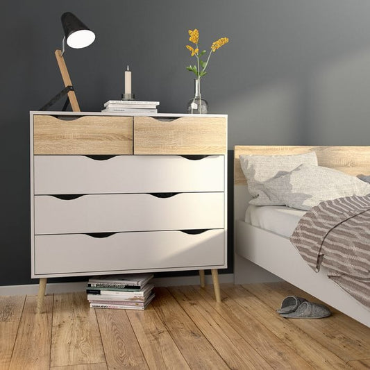 Oslo 4-piece bedroom set in white oak with wardrobe, drawers, and bedside tables.